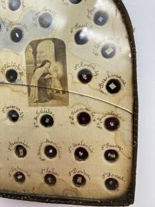 Antique French reliquary with 58 different relics behind glass
