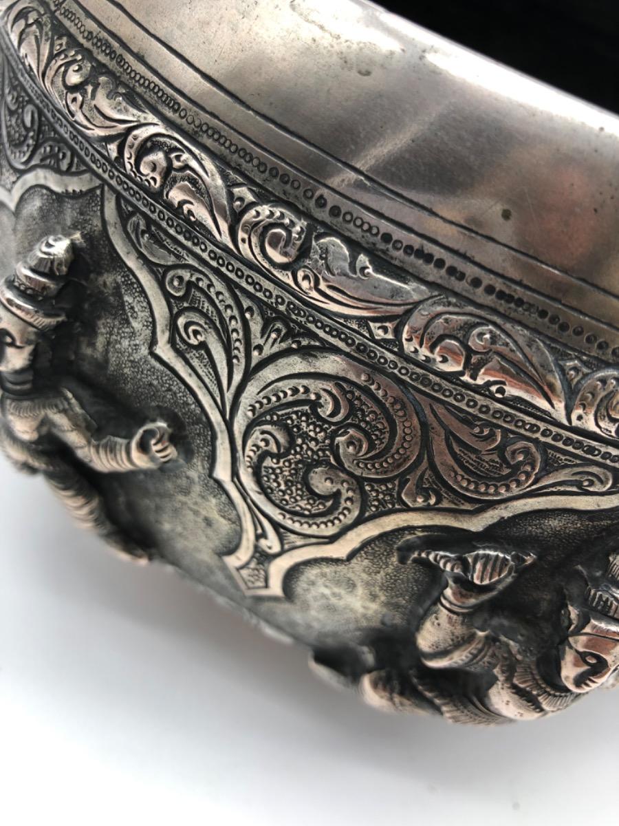 A repousse silver bowl by a peacock maker Burma ca 1900