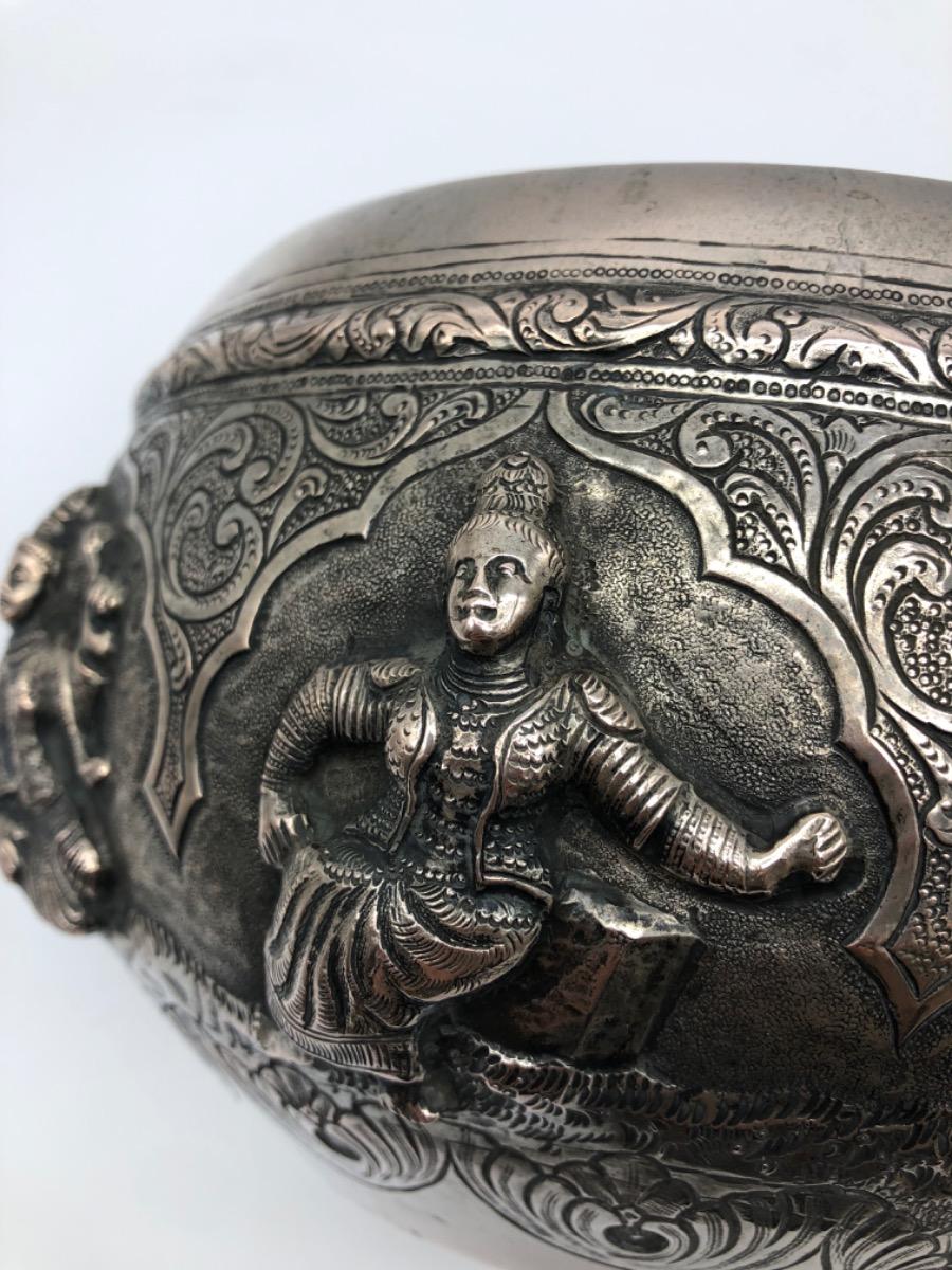 A repousse silver bowl by a peacock maker Burma ca 1900