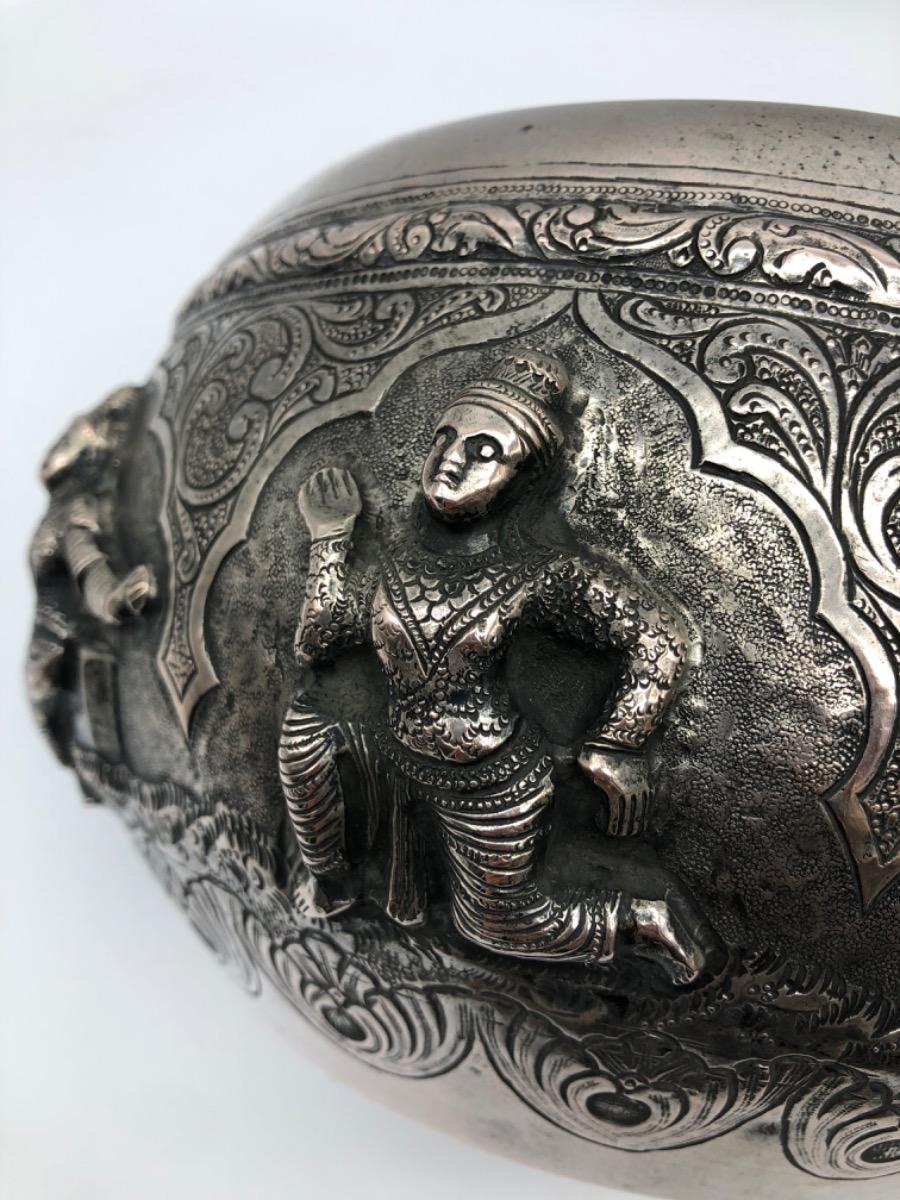 A repousse silver bowl by a peacock maker Burma ca 1900