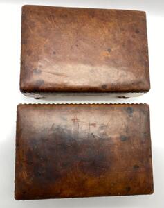 Antique pair of small oak leather topped and studded footstools 