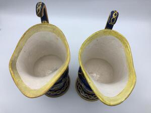 Antique Italian majolica pitchers with a monogram 
