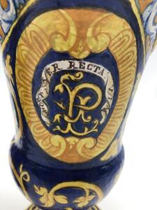 Antique Italian majolica pitchers with a monogram 