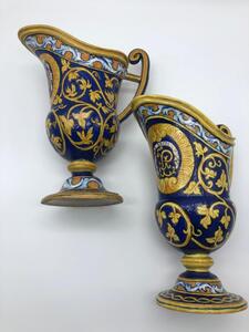 Antique Italian majolica pitchers with a monogram 