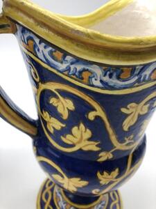 Antique Italian majolica pitchers with a monogram 